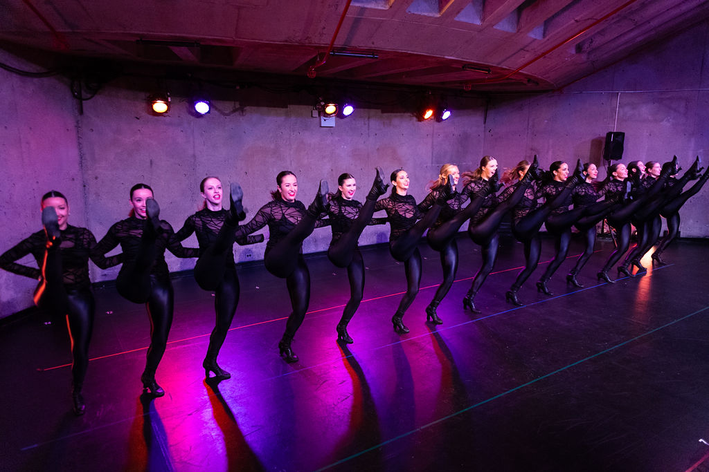Precision kickline at eye height under stage lighting